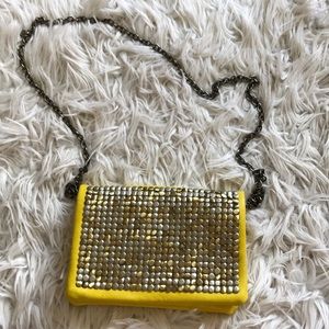 Yellow studded bag mixed metals